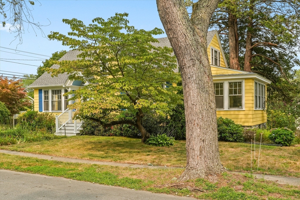 57 Olive Street Methuen, MA 01844 - Photo 2 of 38 a view of house with backyard