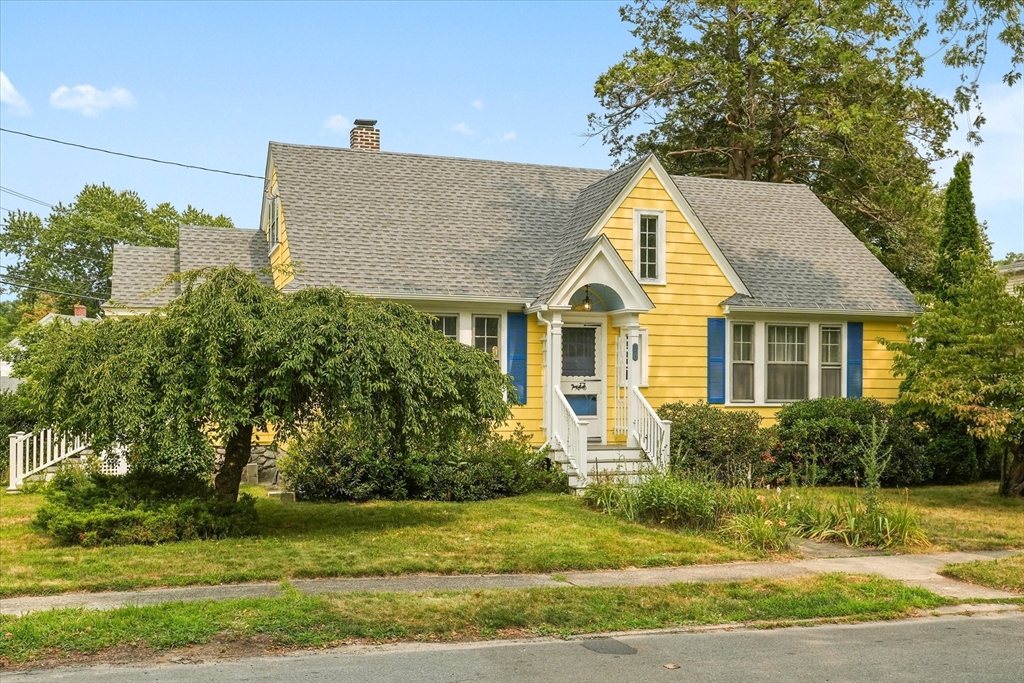 57 Olive Street Methuen, MA 01844 - Photo 31 of 38 a view of a house next to a yard