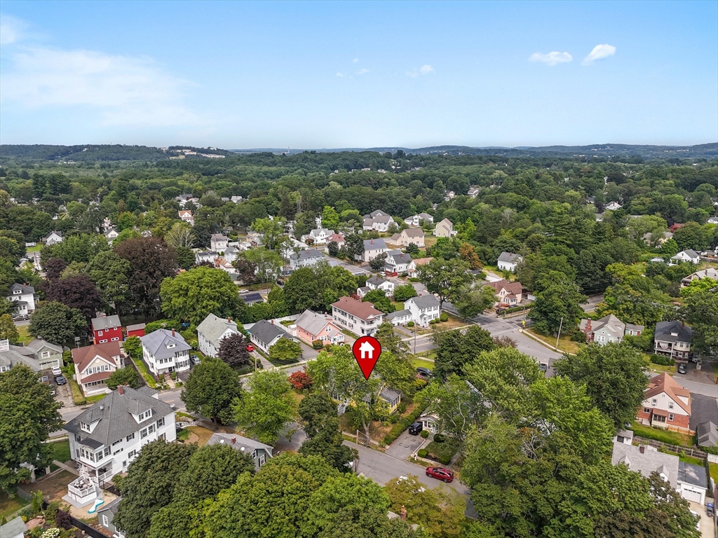 57 Olive Street Methuen, MA 01844 - Photo 36 of 38 an aerial view of residential houses with outdoor space and trees