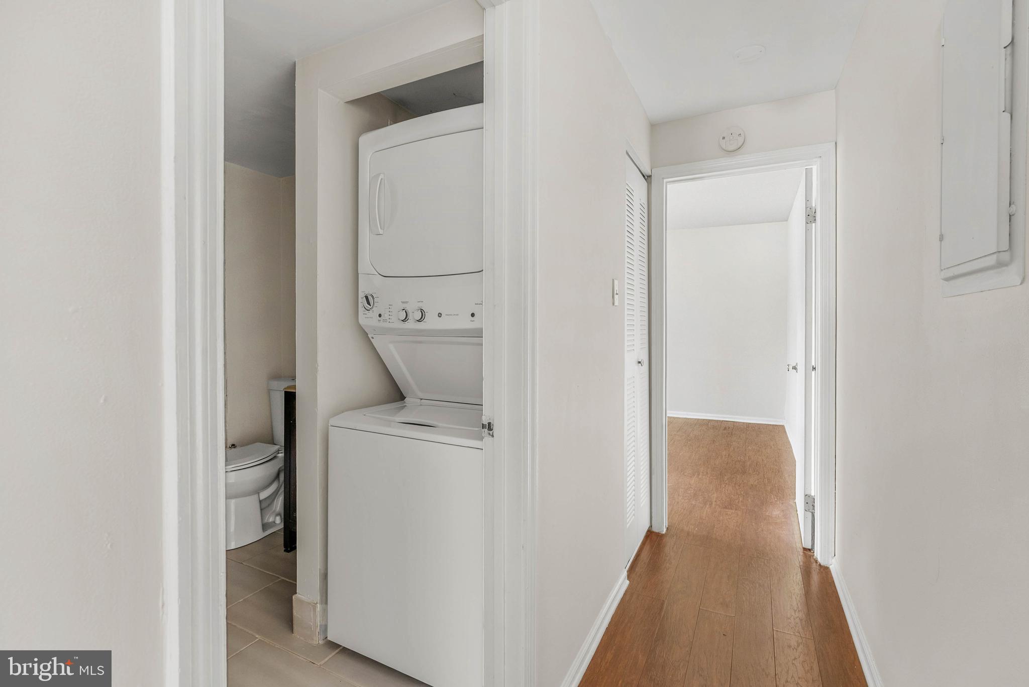 1231 South Philip Street, Unit 1 Philadelphia, PA 19147 - Photo 7 of 8 a view of hallway with washer and dryer