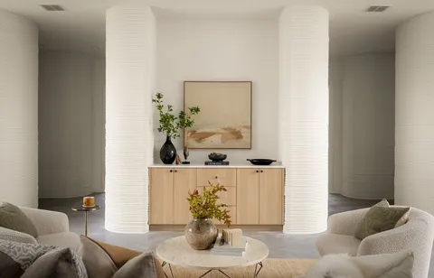 a kitchen with stainless steel appliances a sink and cabinets