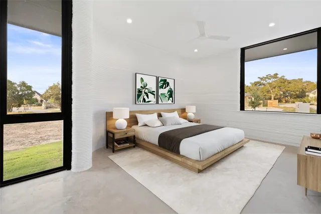 a view of an empty room with a large window