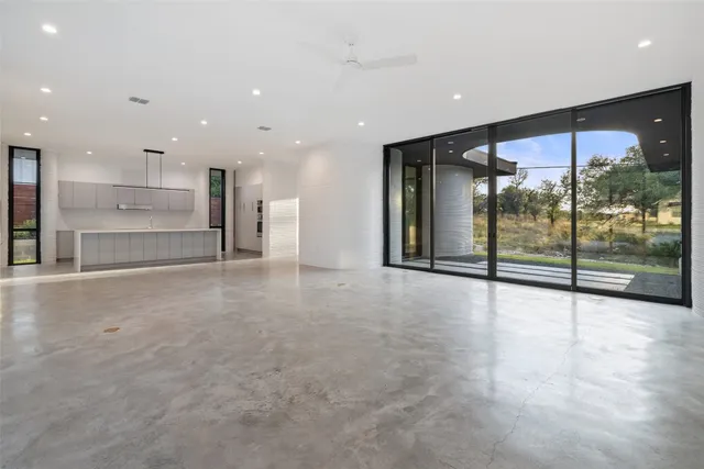 a view of an empty room with a stove
