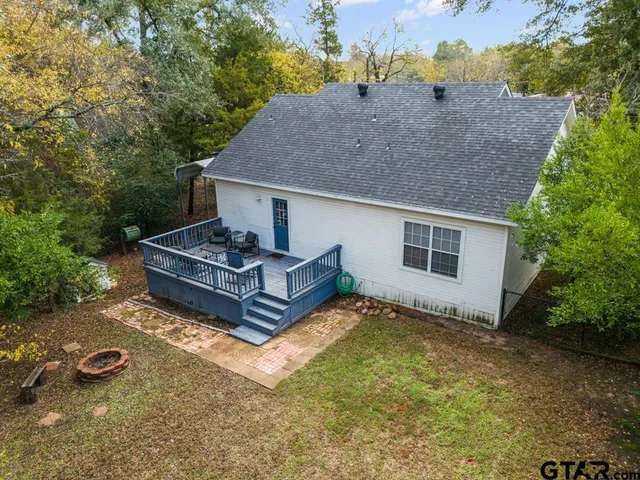 a house view with a outdoor space