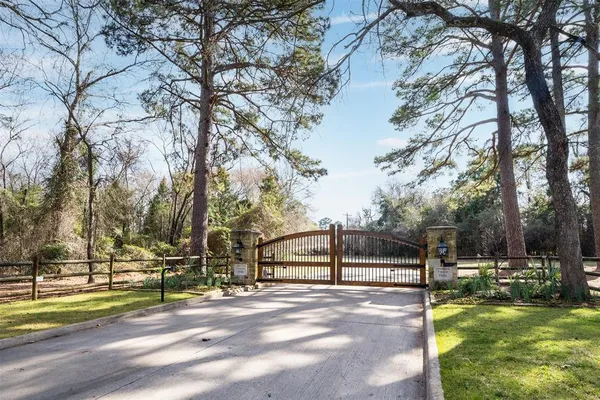 a view of a swimming pool with an outdoor seating