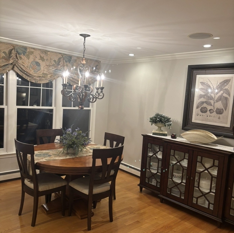 36 Bayberry Lane Hanover, MA 02339 - Photo 4 of 10 a view of a dining room with furniture and wooden floor