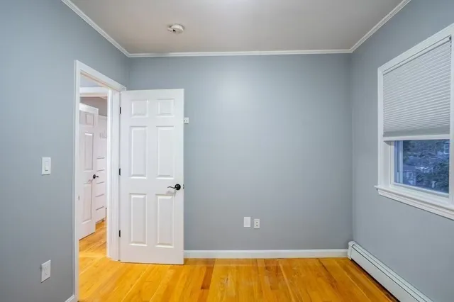 a bathroom with a tub and shower