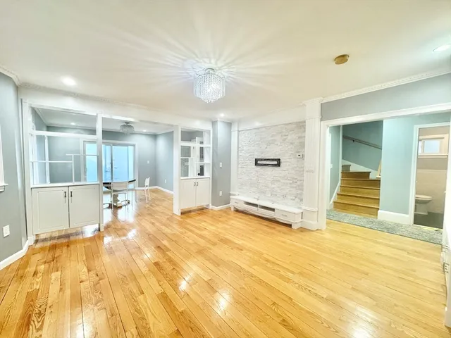 a view of a bathroom with a tub and shower