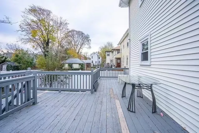 a view of terrace with wooden floor and fence