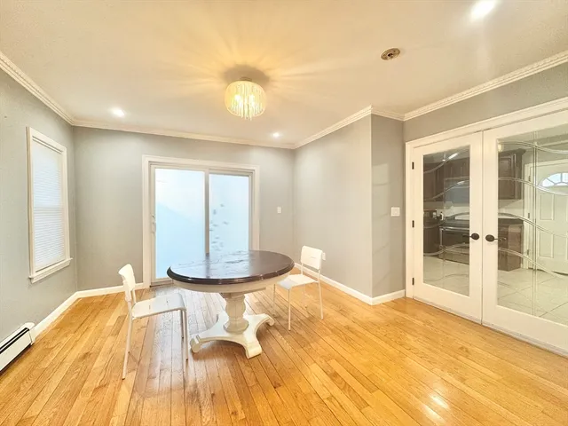 a view of a livingroom with wooden floor