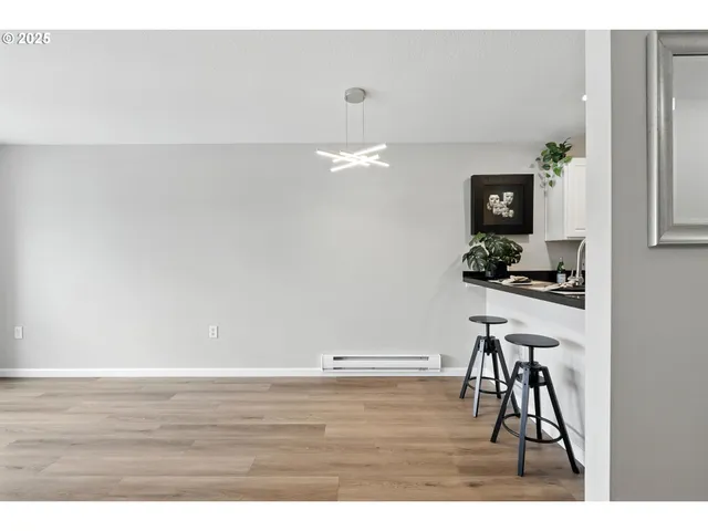 a view of hallway with a large mirror