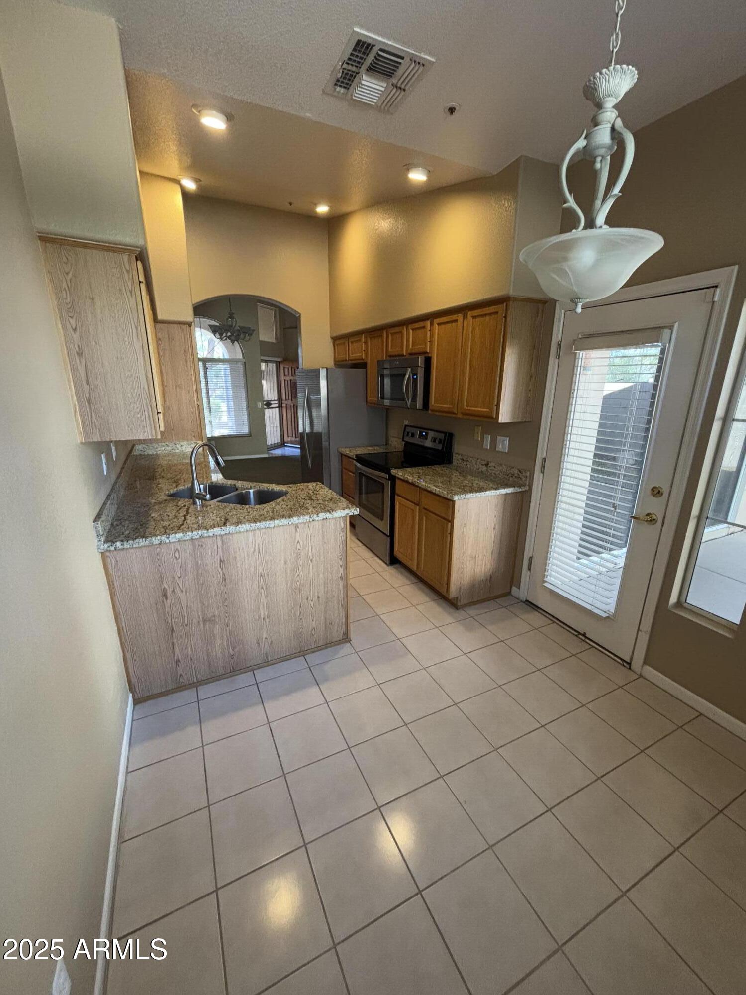 8910 East Maple Drive Scottsdale, AZ 85255 - Photo 11 of 13 Eat-in Kitchen