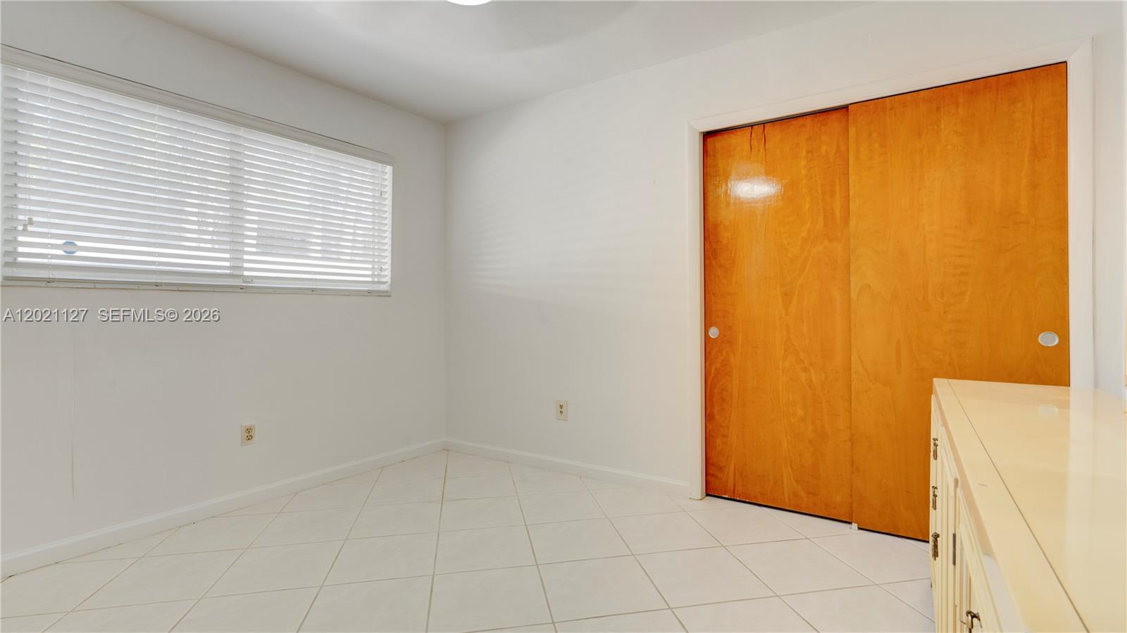3611 Southwest 23rd Street Miami, FL 33145 - Photo 25 of 56 3613 - bedroom 2 with 2 closets and plenty of light