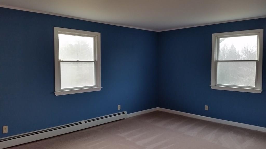 1300 Battle Ridge Road Clinton, ME 04927 - Photo 23 of 27 Large bedroom facing the back, fresh...