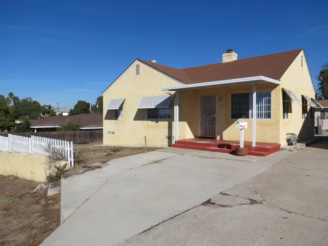 a view of a house with a patio