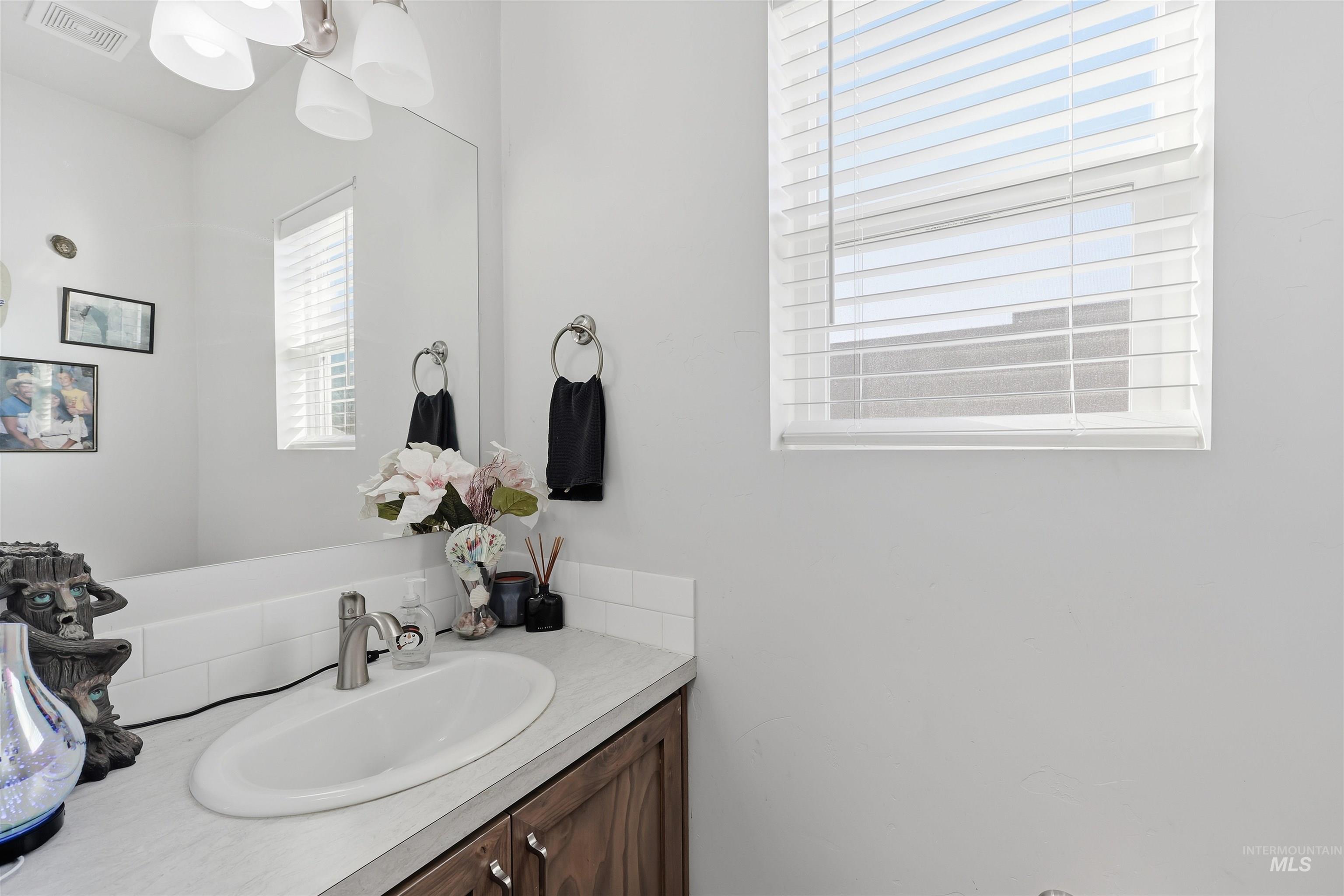 6341 South Ruddsdale Avenue Boise, ID 83709 - Photo 23 of 41 Bathroom with vanity