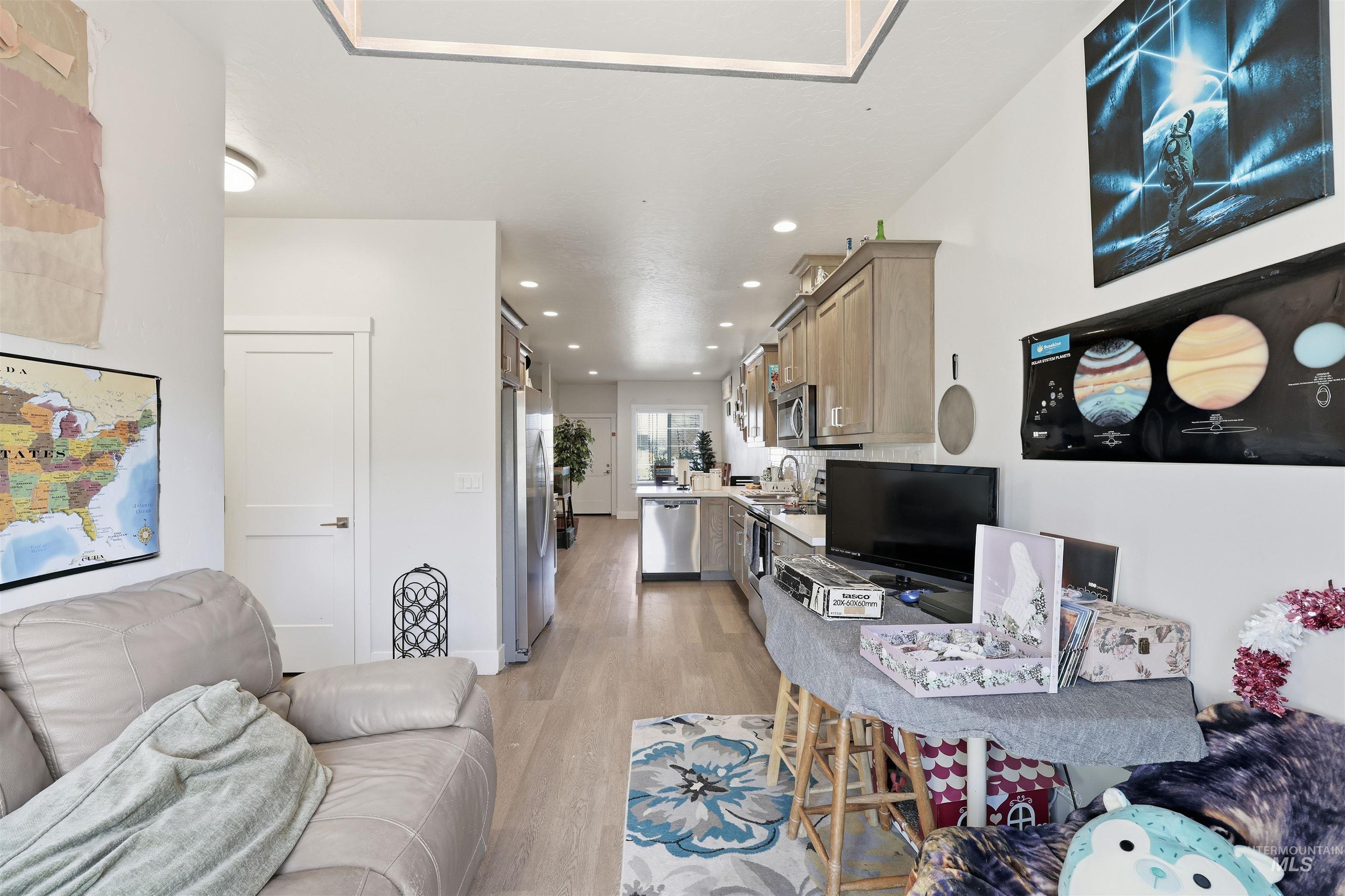 6341 South Ruddsdale Avenue Boise, ID 83709 - Photo 25 of 41 Living area with light wood finished floors and recessed lighting
