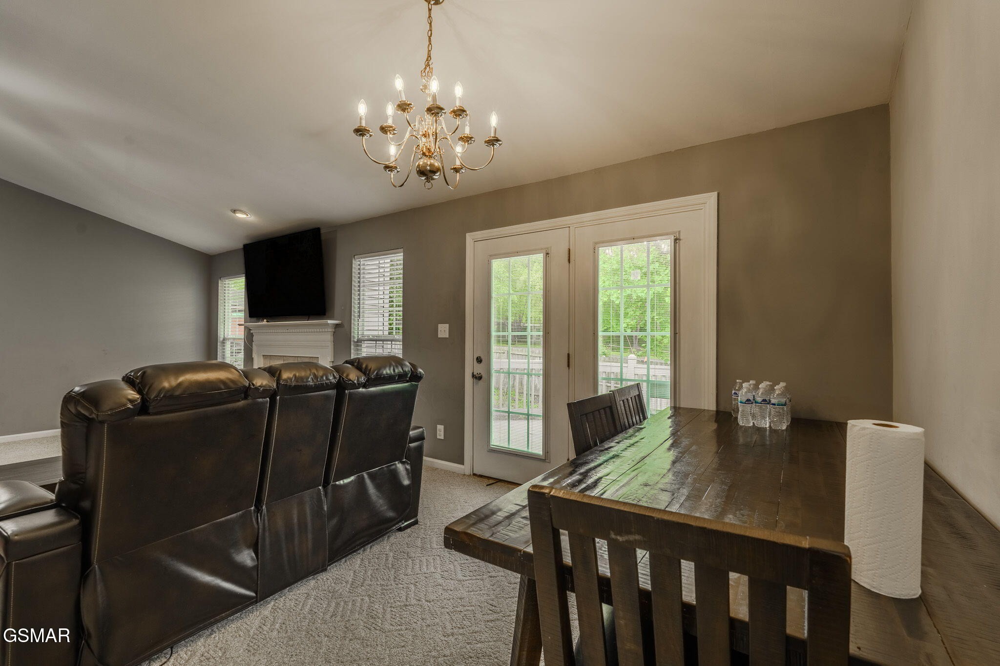 7213 Emerald Heath Road Powell, TN 37849 - Photo 12 of 27 a room with furniture and chandelier