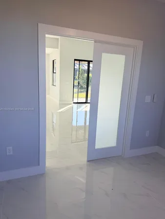 an empty room with windows