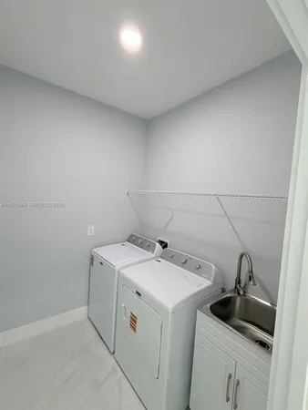 a view of a room with storage and utility racks