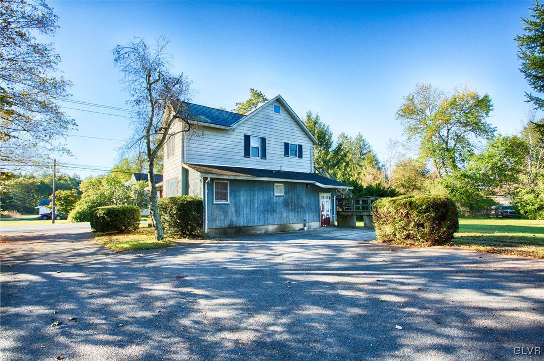 1071 Interchange Road Gilbert, PA 18331 - Photo 21 of 22 a front view of a house with a yard