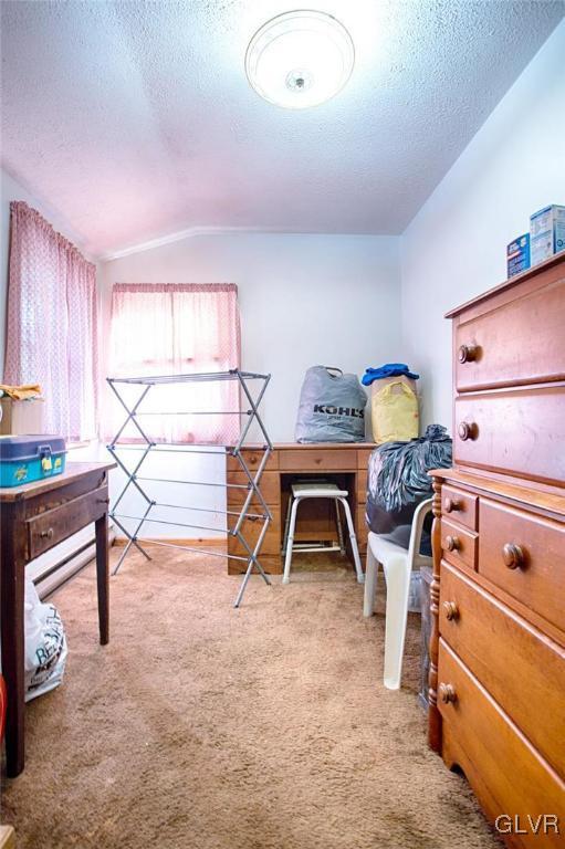 1071 Interchange Road Gilbert, PA 18331 - Photo 9 of 22 a bedroom with furniture and a gym equipment