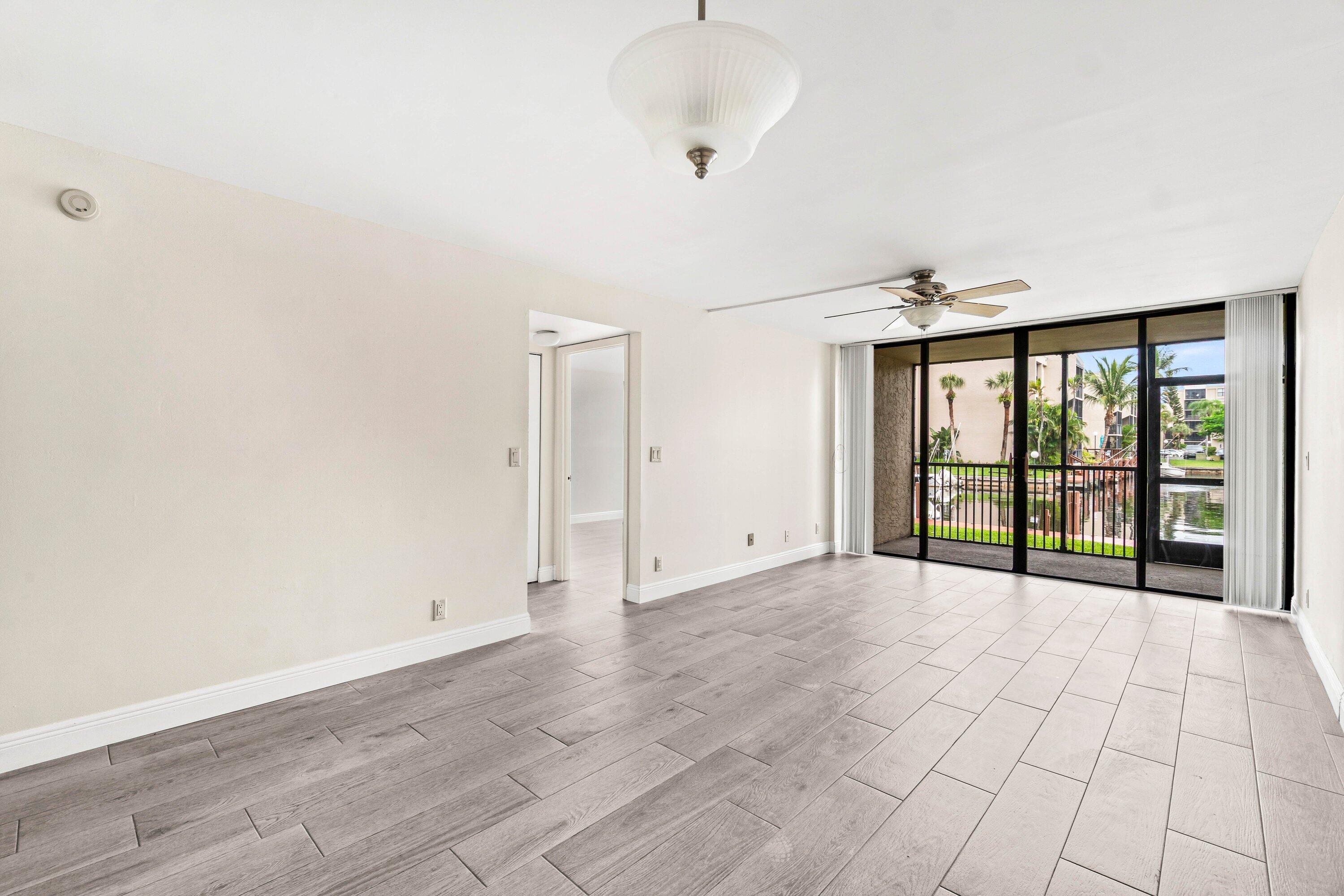 17 Royal Palm Way, Unit 103 Boca Raton, FL 33432 - Photo 12 of 28 a view of an empty room with a window