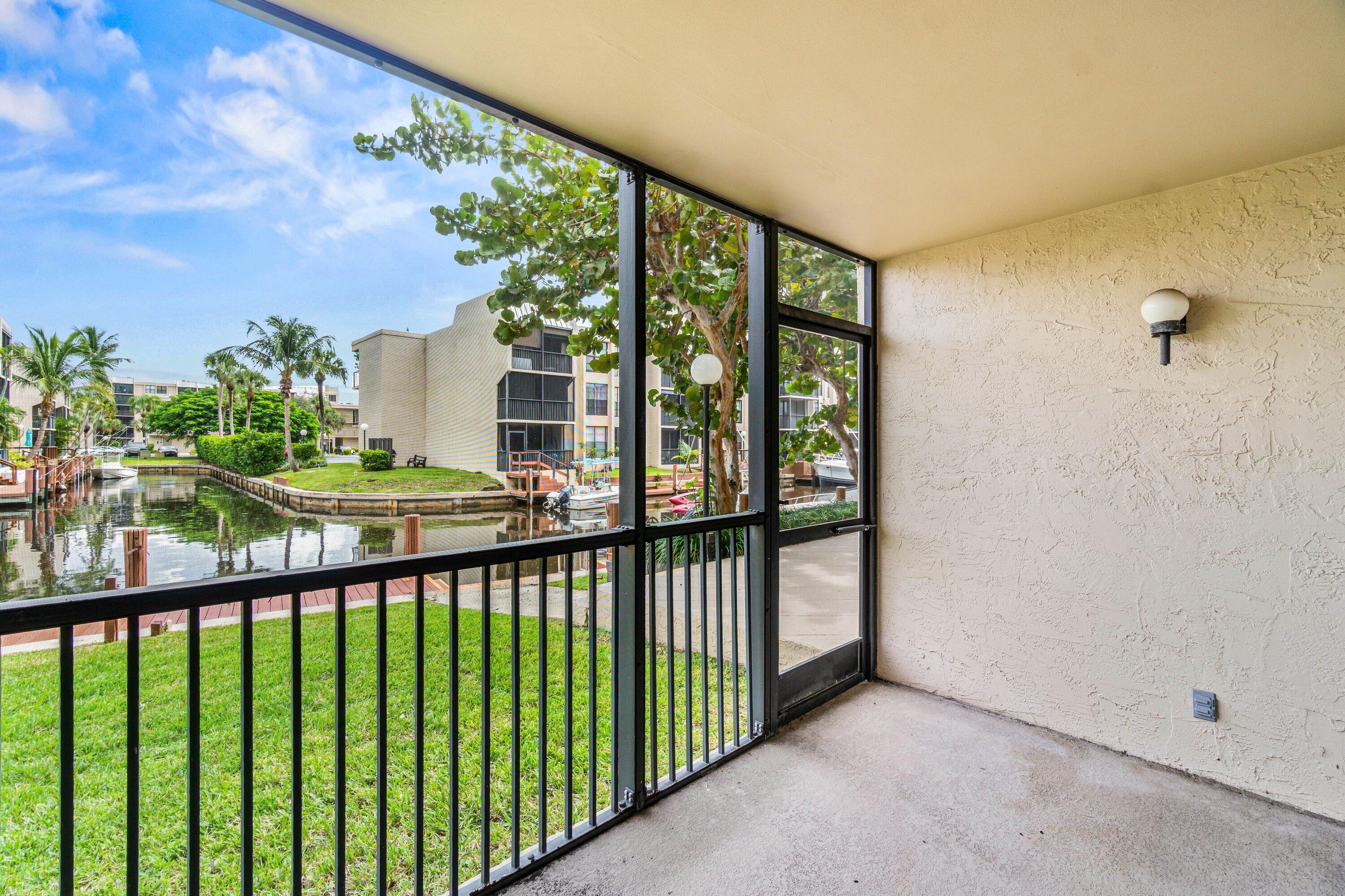 17 Royal Palm Way, Unit 103 Boca Raton, FL 33432 - Photo 2 of 28 a view of city from a balcony