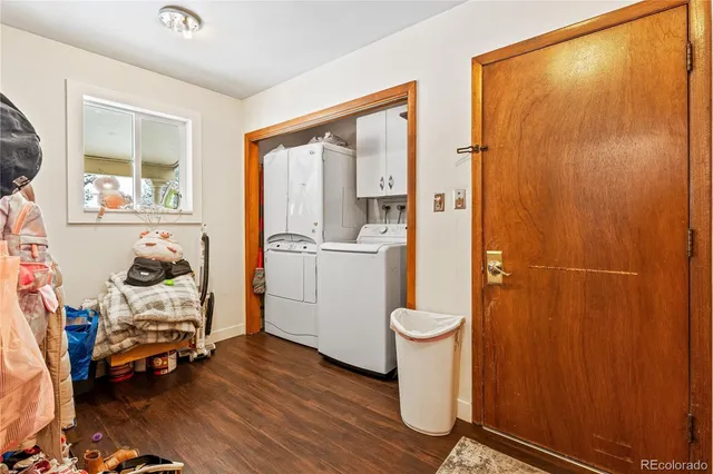 a view of a livingroom with furniture and toys