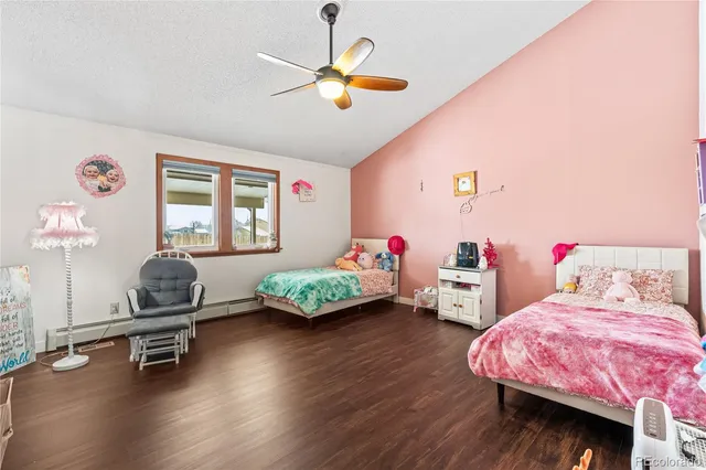 a workspace with furniture wooden floor and window