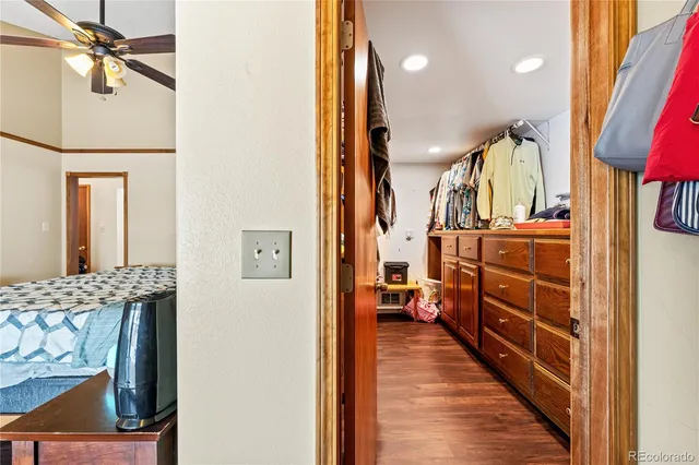 a kitchen with stainless steel appliances granite countertop a sink and a refrigerator