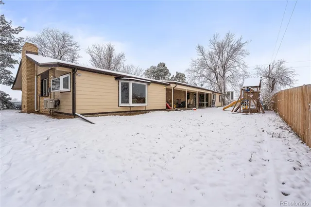 a room with furniture and a window