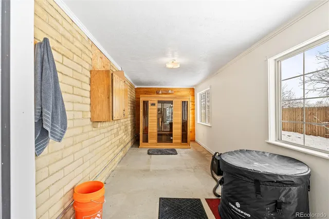 a view of a hallway with the view of living room