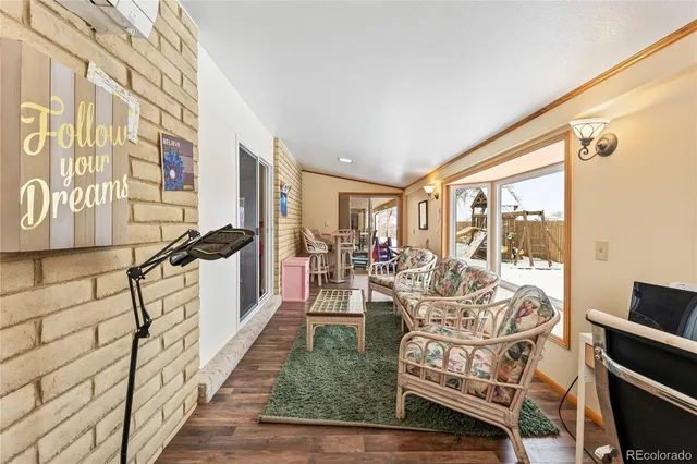 a view of a living room and hardwood floor