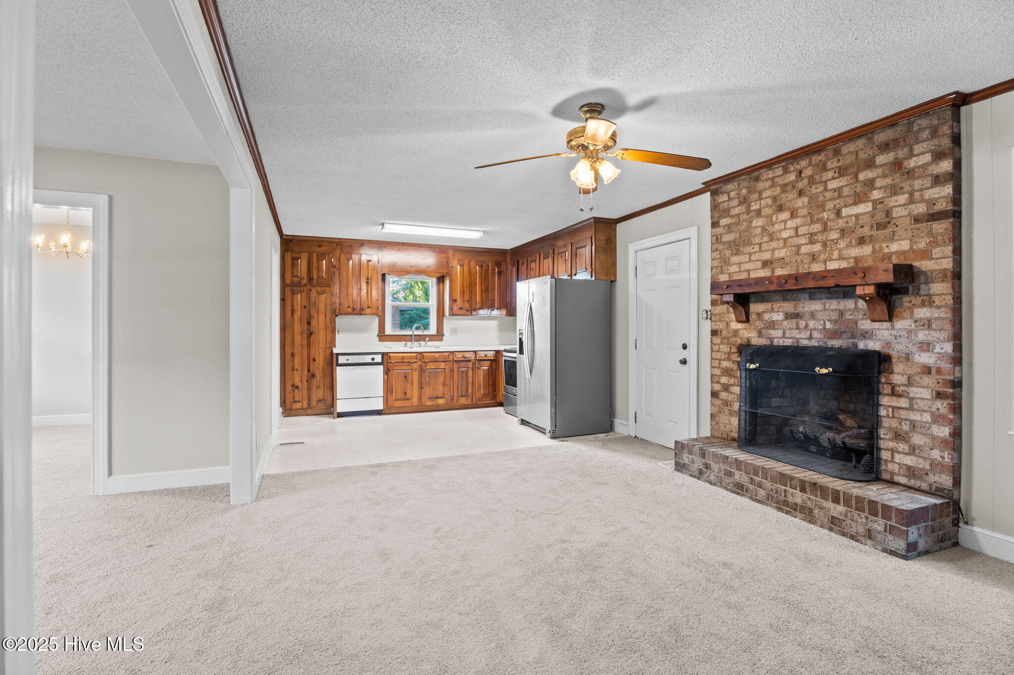 627 Greyson Road Rocky Mount, NC 27804 - Photo 13 of 32 Den looking into kitchen
