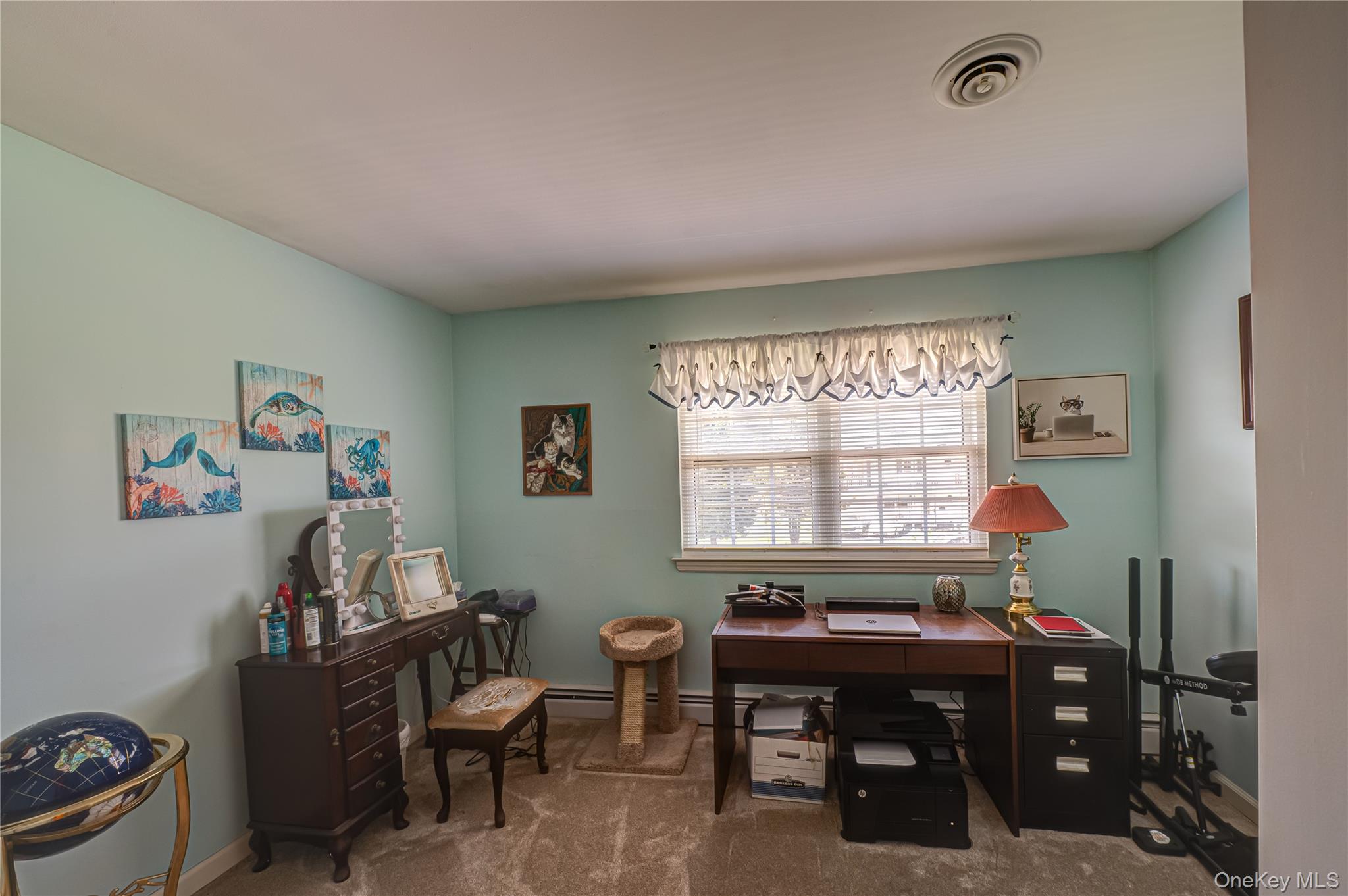 20 Bayview Road Amityville, NY 11701 - Photo 16 of 24 a view of a workspace with furniture and a window