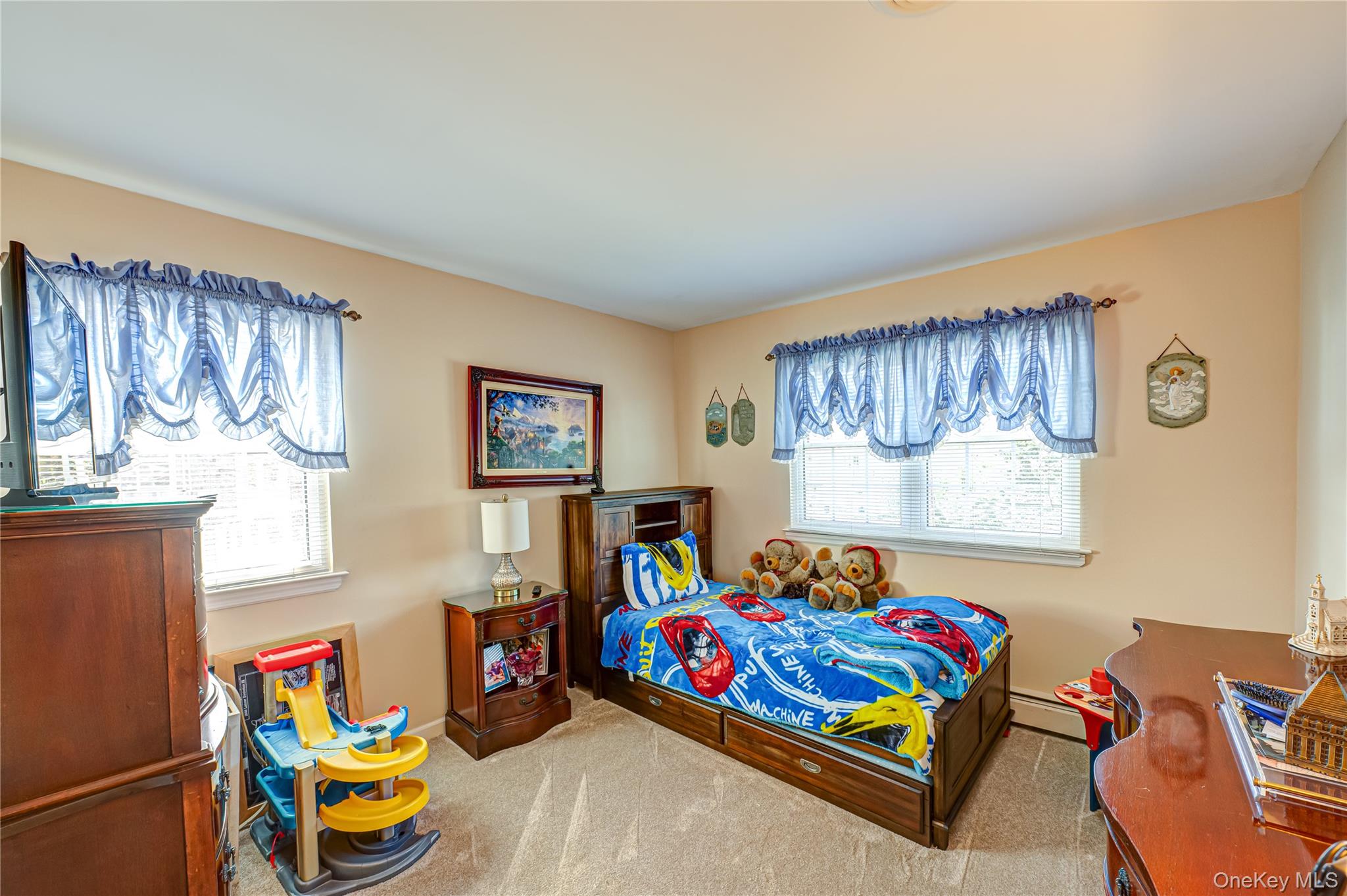 20 Bayview Road Amityville, NY 11701 - Photo 17 of 24 a bedroom with a bed and a window