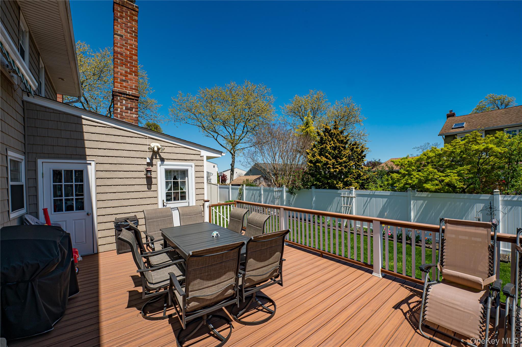 20 Bayview Road Amityville, NY 11701 - Photo 22 of 24 a view of a deck with furniture