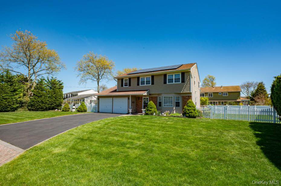 20 Bayview Road Amityville, NY 11701 - Photo 24 of 24 a view of a house with a yard