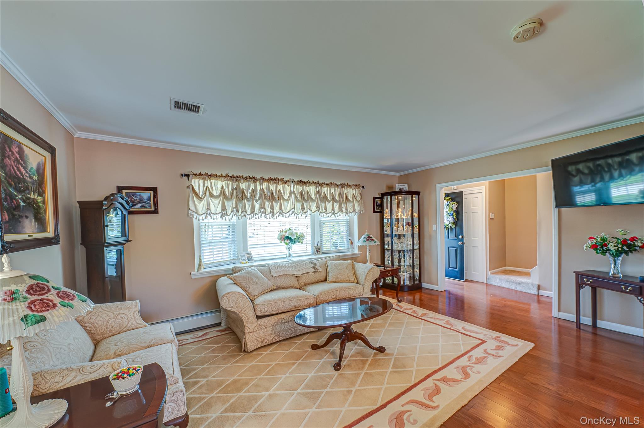 20 Bayview Road Amityville, NY 11701 - Photo 3 of 24 a living room with furniture and a large window