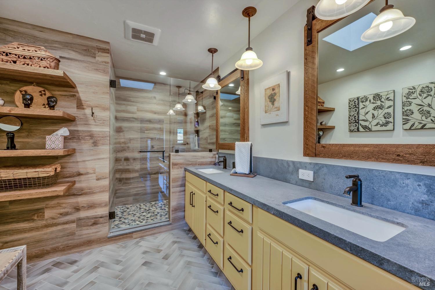 1389 Canyon Road Geyserville, CA 95441 - Photo 25 of 59 a bathroom with a granite countertop sink mirror and shower