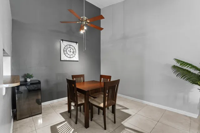 a kitchen with a sink a stove and refrigerator