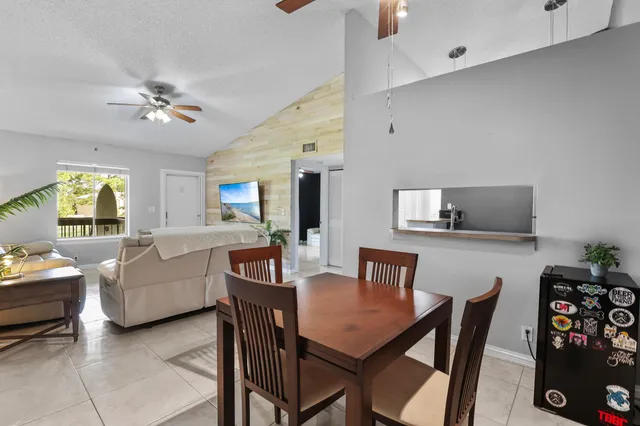 a kitchen with a stove microwave and refrigerator