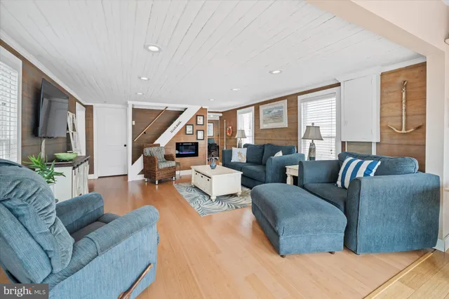 a view of kitchen with furniture and wooden floor