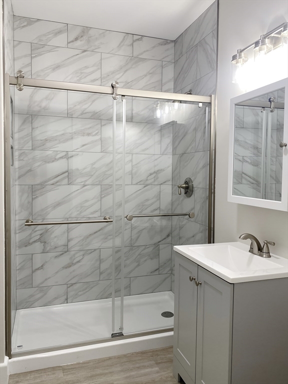 44 Jones Road, Unit 5 Revere, MA 02151 - Photo 9 of 11 a bathroom with a shower and sink