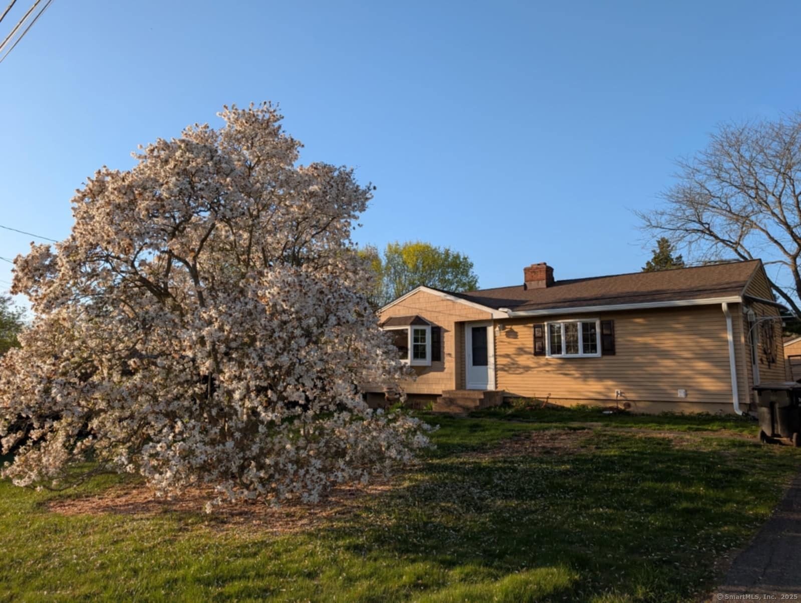 27 Payne Place Meriden, CT 06450 - Photo 1 of 1 a front view of a house with a yard
