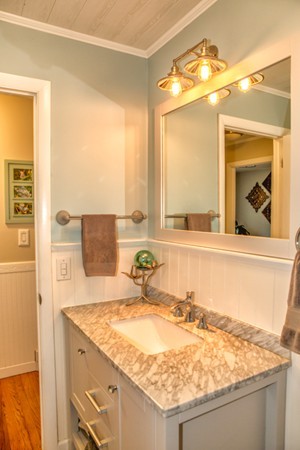74 Ellendale Circle Springfield, MA 01128 - Photo 10 of 24 a bathroom with a granite countertop sink and a mirror