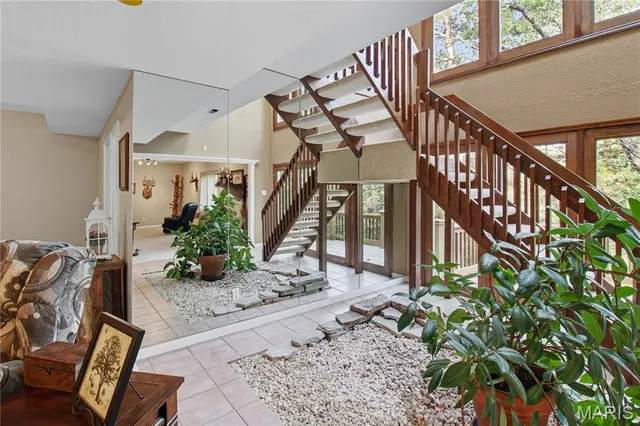 $409,900 | 709 Heatherstone Drive, High Ridge, MO 63049