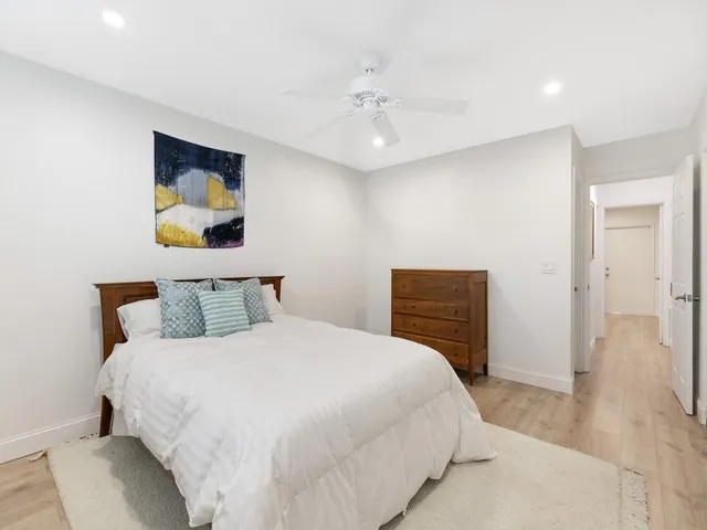 a bedroom with a bed and a closet