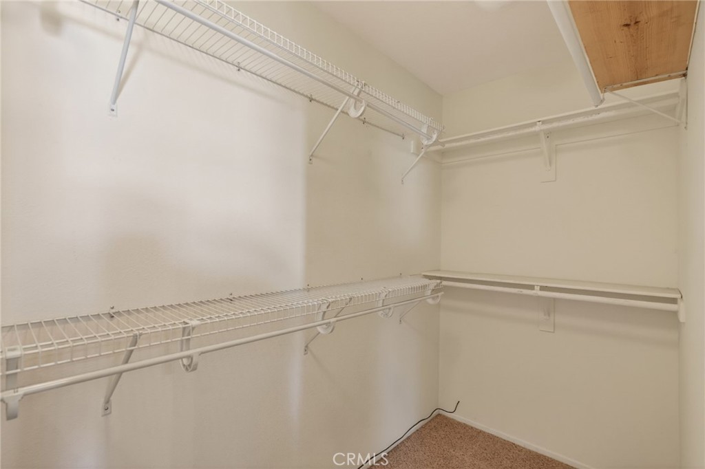3560 McKinley Street Riverside, CA 92506 - Photo 17 of 45 a view of a room with racks on the wall